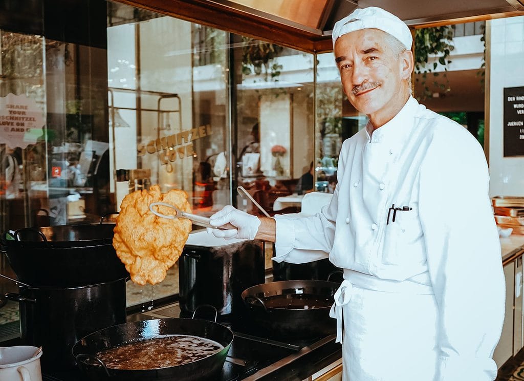 Schnitzel cook in a kitchen